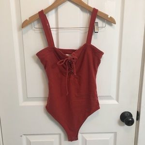 Nwot tie bodysuit burnt orange medium